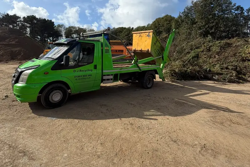 4-yard skip of green waste tipped for recycling